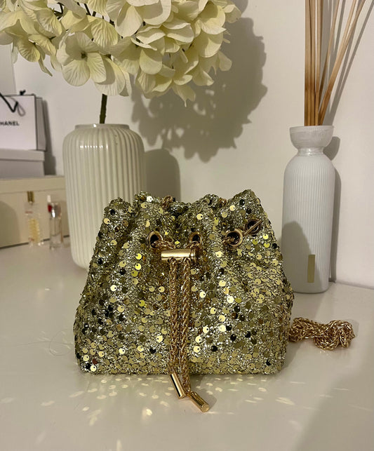 Sac bourse à sequins doré