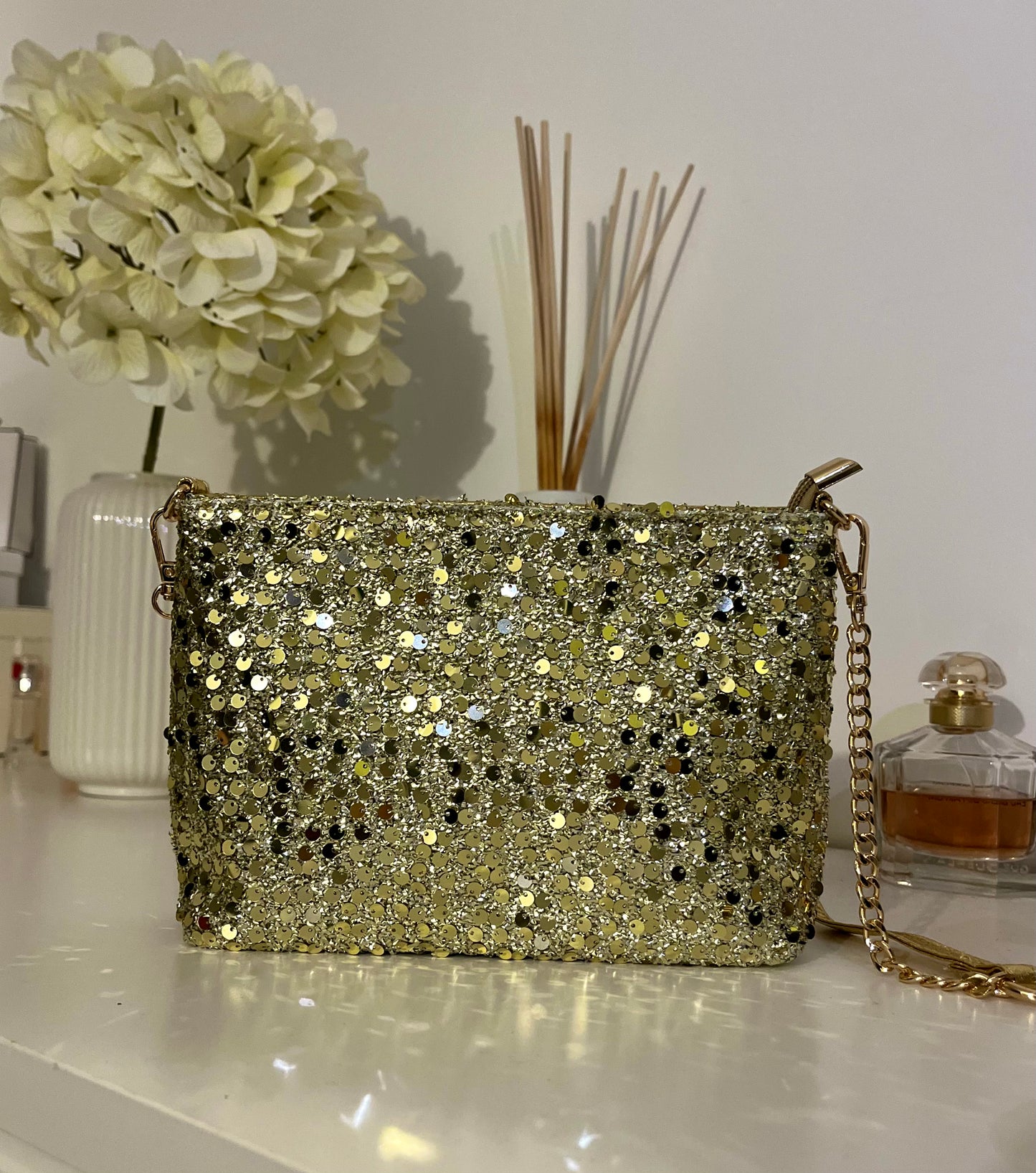 Pochette à sequins dorée